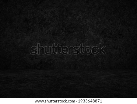 dark concrete interior, plaster black background Royalty-Free Stock Photo #1933648871