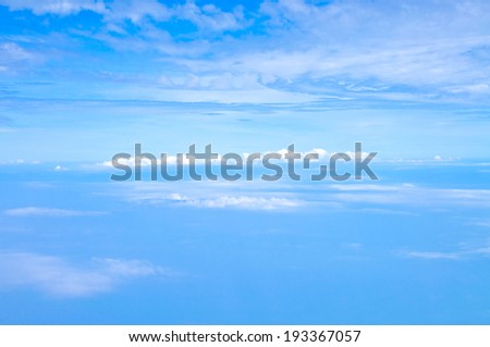 Clouds in the blue sky Above the Sky Shot From Airplane for background wallpaper and texture.
