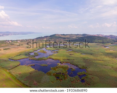 Aerial view of the city of Tihany and the abbey of Tihany, in the background the lake Balaton, in the Balaton upland in Hungary
