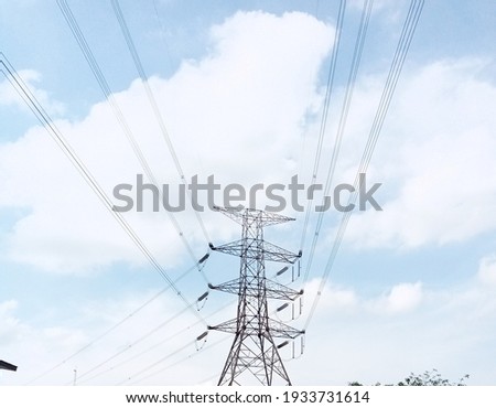 Electric tower with a blue sky background