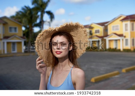 woman with hat walk destination hotels vacation