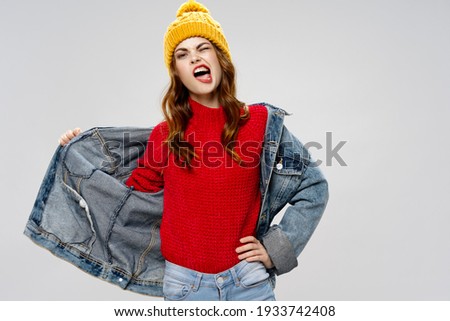 fashionable woman in clothes modern style emotions studio