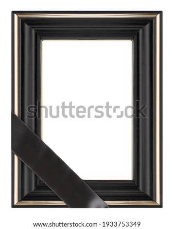 Wooden frame with black mourning ribbon for paintings, mirrors or photo isolated on white background. Design element with clipping path