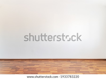 Empty room with wooden floor Royalty-Free Stock Photo #1933783220