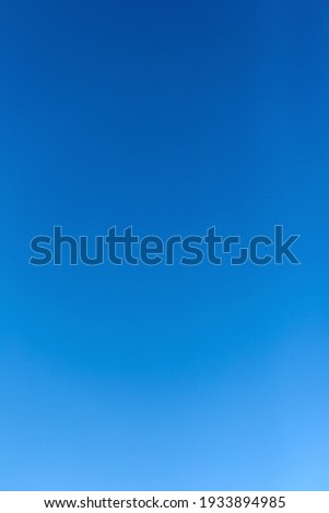 Clear sunny blue sky background Royalty-Free Stock Photo #1933894985