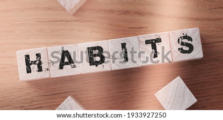 Habits Word on Wooden Cubes. Healthy living concept.