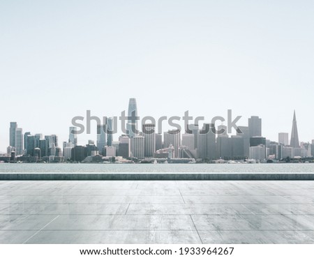 Empty concrete embankment on the background of a beautiful San Francisco skyline at daytime, mock up