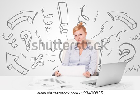 Attractive young businesswoman brainstorming with drawn arrows and symbols