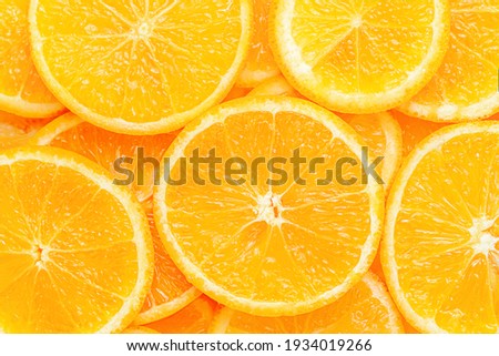 Orange fruit pattern. Healthy food background, directly above. Royalty-Free Stock Photo #1934019266