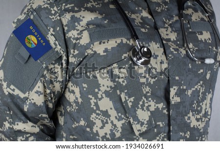 Montana Army patch on military uniform doctor with stethoscope over his neck