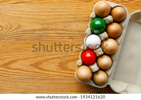 Easter eggs as the color of the Italian flag - green, white, red. Happy Easter holiday card