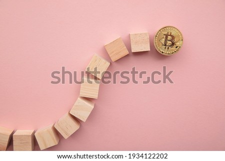 Bitcoin cryptocurrency coin blockchain technology concept. Coin with wood block