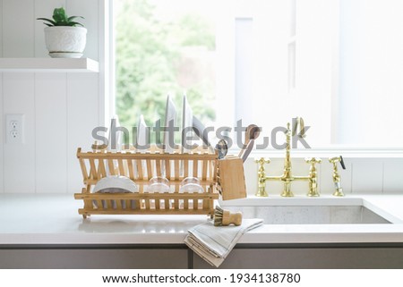 Eco Friendly Bamboo Drying Rack in Modern Kitchen Royalty-Free Stock Photo #1934138780