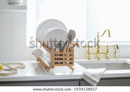 Eco Friendly Bamboo Drying Rack in Modern Kitchen Royalty-Free Stock Photo #1934138837