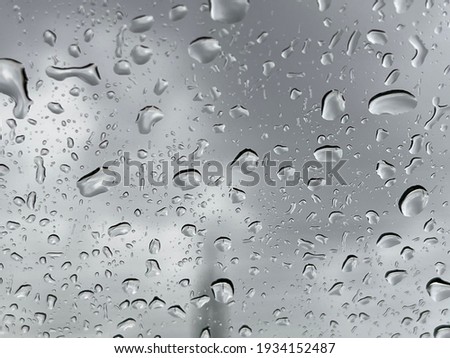 Stunning Rain drops on glass selective focus