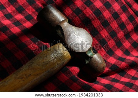 Close up of a ball peen hammer. Photo shows tool used for metal work concept.