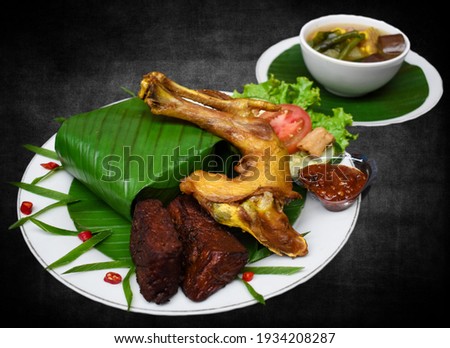 Sundanese chicken nasa, with additional tamarind vegetables and bacem tempeh.
