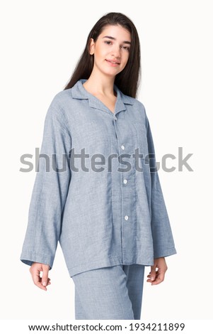 Woman in gray pajamas nightwear studio shoot Royalty-Free Stock Photo #1934211899