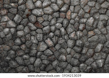Stones, rocks and boulders - as a stone wall background texture