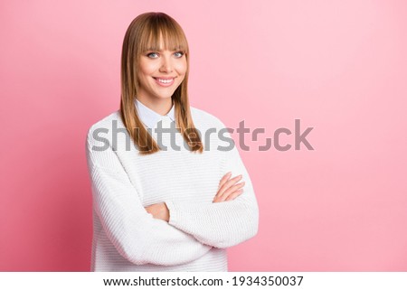 Photo of young happy positive confident successful confident woman with crossed arms isolated on pink color background