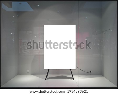 View of storefront with blank white banner for advertisement