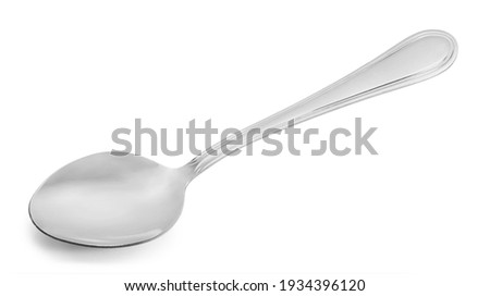 metal spoon isolated on white. Royalty-Free Stock Photo #1934396120