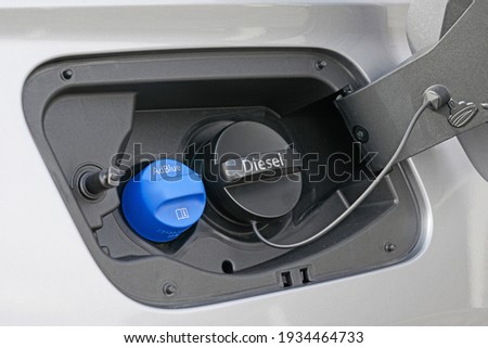 Tank filler neck for AdBlue and Diesel  Royalty-Free Stock Photo #1934464733