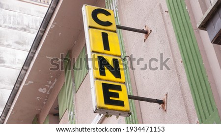 Retro cinema sign in a facade