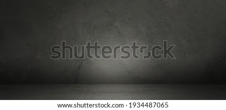 Concrete wall and floor background for product display or mock up, tree dimensional show room in the dark