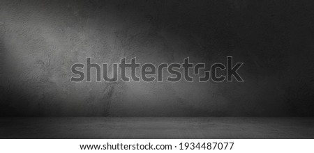 dark concrete background, thee dimensional room with stone wall and cement floor. Product display or mock up banner with copy space