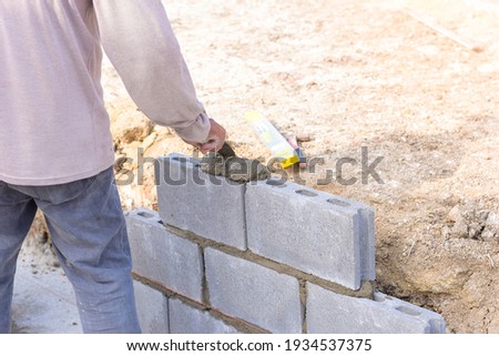 Workers are laying blocks of bricks, Construction work