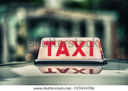 Red Taxi Sign.