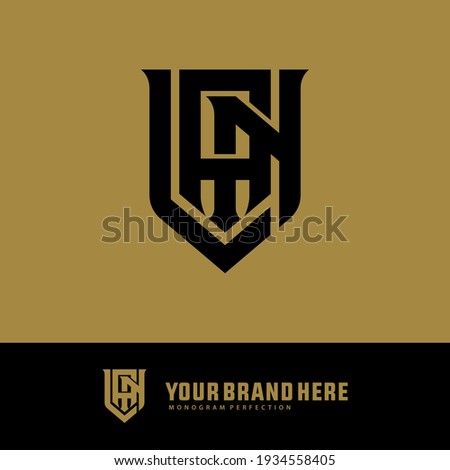 Initial letters L, A, N, LAN, LNA, ALN, ANL, NLA or NAL overlapping, interlock, monogram logo, black color on gold background