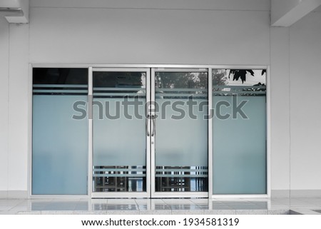 Front doors, glass doors, aluminium door of the store and the office. Royalty-Free Stock Photo #1934581319