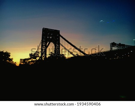the brooklyn bridge at sun down