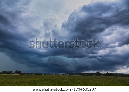 Supercell storm clouds with hail and intence winds Royalty-Free Stock Photo #1934633207