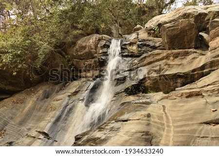 turga waterfalls, purulia, west bengal, india with slow shutter speed and selective focus