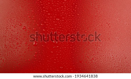 Waterdrops on a red background. Background. Water drops Royalty-Free Stock Photo #1934641838