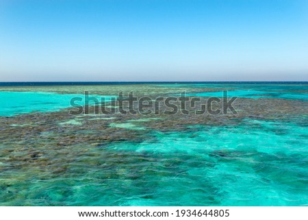 Red sea coral reef and blue sky. El Gouna, Egypt
