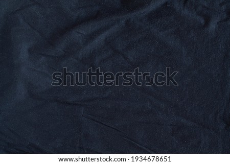 Black cotton blended fabric texture.