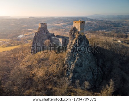 Ruins of gothic castle Trosky in National Park Cesky Raj - in english Czech Paradise. Aerial view to medieval monument in Czech Republic. Central Europe.