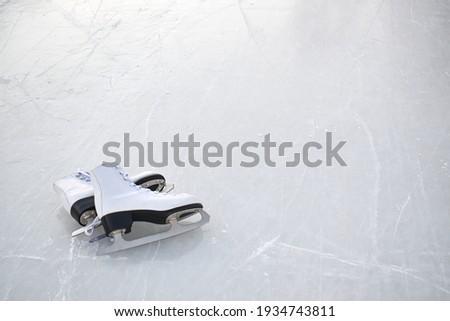 Sharp skates for winter skating on the ice rink.