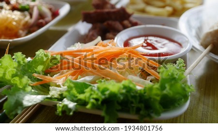 Fresh vegetable salad, a side dish, served with sun dried pork Or eat with steak 