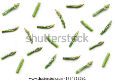 Fresh asparagus pattern. Top view. Food vegan backdrop.  Royalty-Free Stock Photo #1934818361