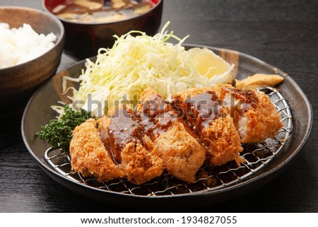 Pork cutlet and shredded cabbage with  Worcestershire sauce Royalty-Free Stock Photo #1934827055
