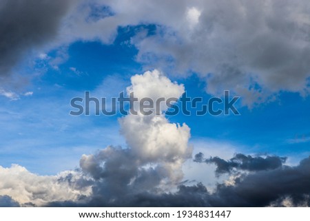 beautiful view of clouds and sky. Clouds form when warm, moist air rises through the lower atmosphere, after which the air expands and cools and some of it condenses into tiny droplets of water.