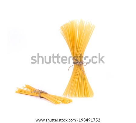 Bow tie of italian spaghetti pasta. Isolated on a white background.