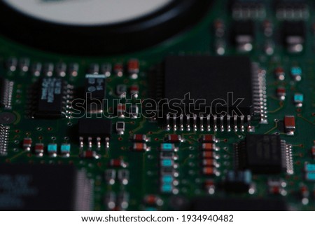 close-up chips, of a circuit, board, microcircuit. Green printed computer motherboard with microcircuit. concept of sale, repair of computer equipment. space for text, advertising Royalty-Free Stock Photo #1934940482