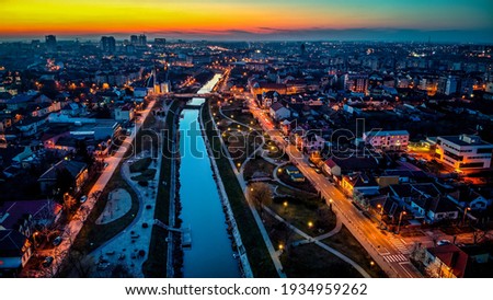 Aerial view of city of Timisoara at dusk. Photo taken on 3rd of March 2021 Timisoara, Timis County, Romania. Royalty-Free Stock Photo #1934959262