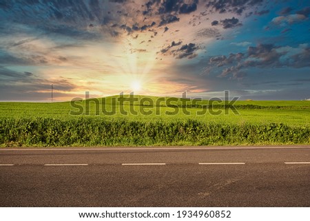 Horizon Of A Beautiful Rural Landscape Along The Road. Image with copy space. Landscape With A Dramatic Sky. Nature